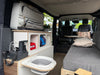 Kia PV5 Interior - Day Mode with Sofa and Sink and Packbags