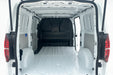 Empty white van interior with open doors