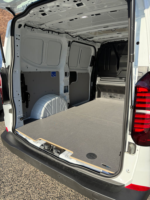 Open cargo area of a van with a flatbed floor