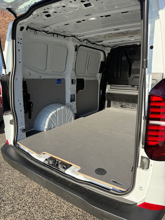 Open cargo area of a van with a flatbed floor