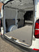 Open cargo area of a van with a flatbed floor