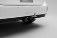 White Volkswagen Electric van ID Buzz on a gray background